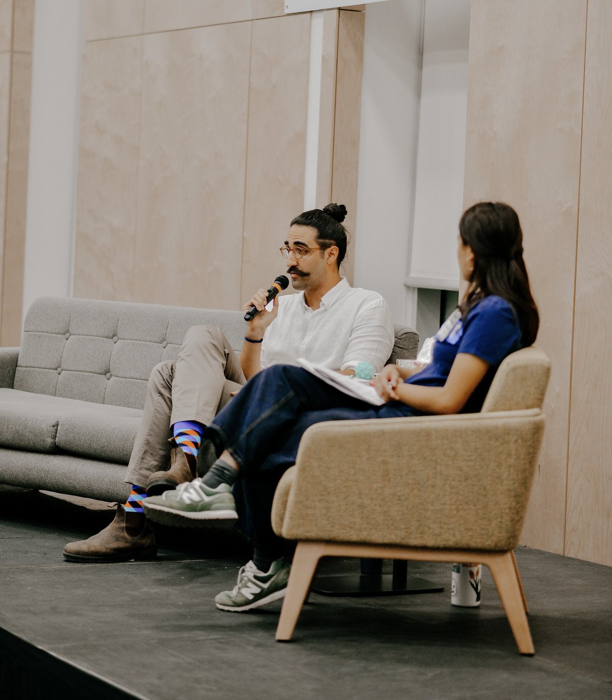 Utku Ucay speaking at a workshop